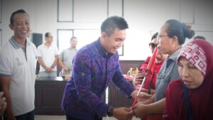 penyerahan tongkat adaptif