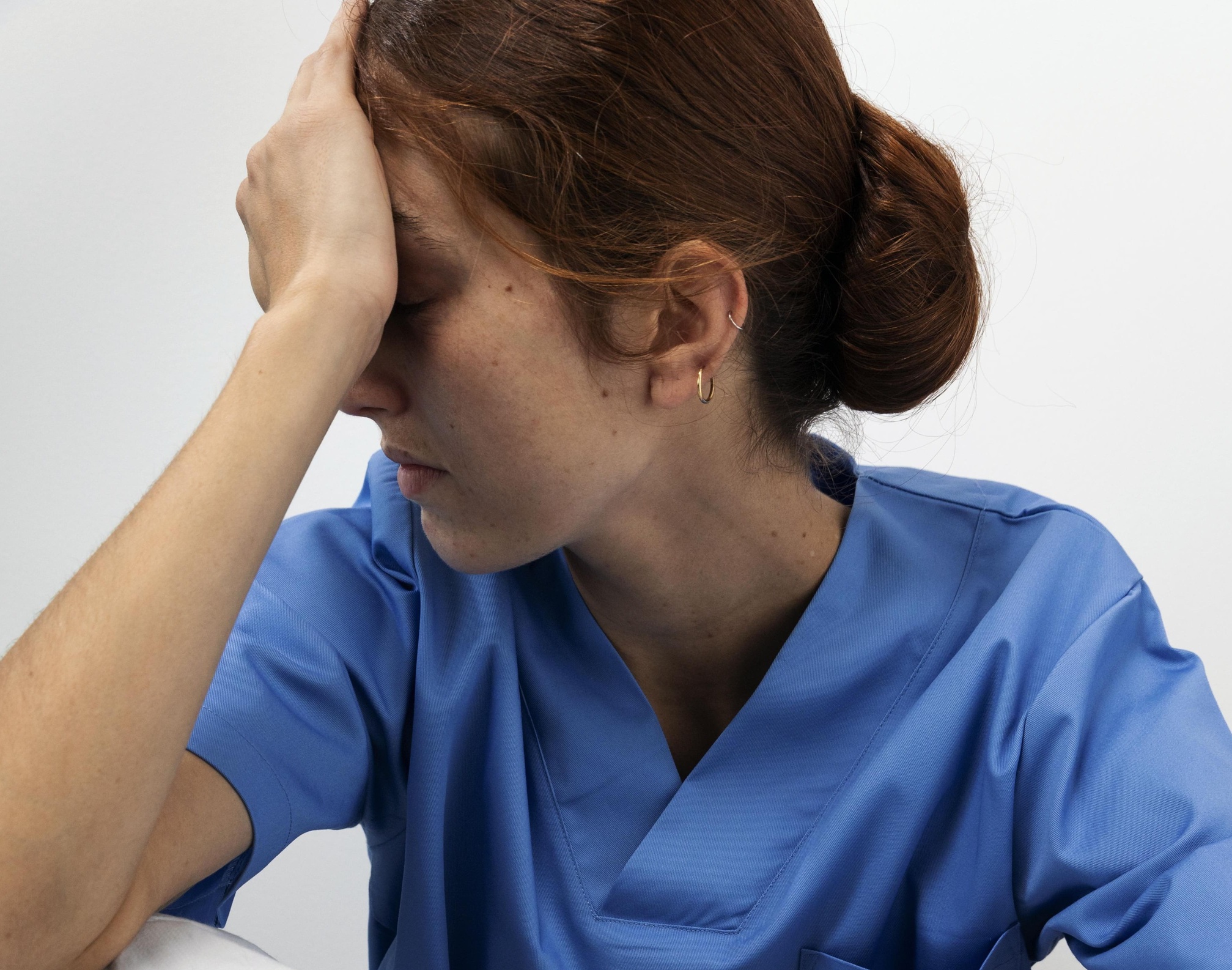 medium-shot-tired-woman-sitting-1_50