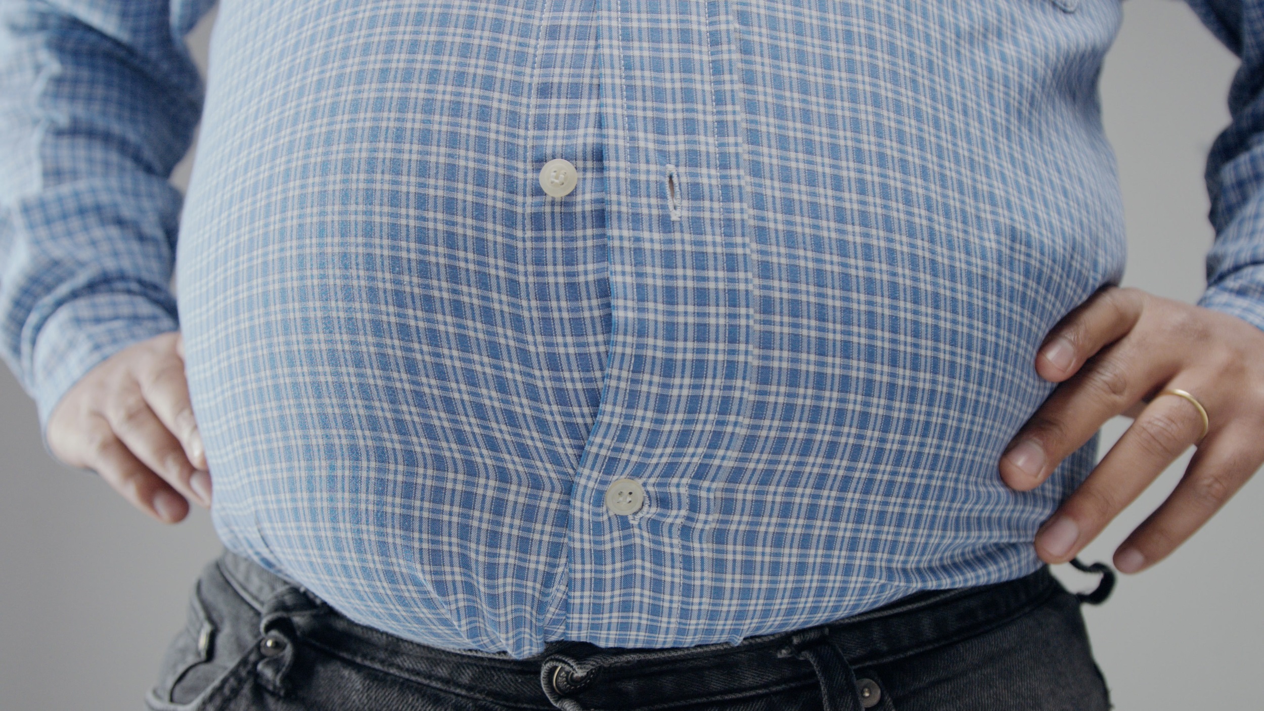 overweight man closeup of belly Diet concept. Fisheye belly closeup