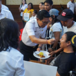 Bupati Wayan Adi Arnawa saat meluncurkan Program Pemberian Bantuan Perlindungan dan Rehabilitas Sosial Bagi Penyandang Disabilitas di Kabupaten Badung