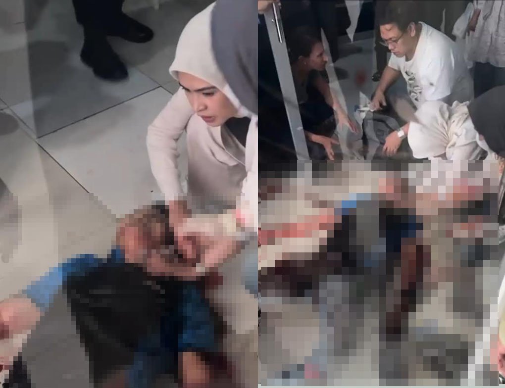 Agrapinus Rumatora tergeletak di lantai bandara Karel Sadsuitubun, setelah di tikam oleh OTK.